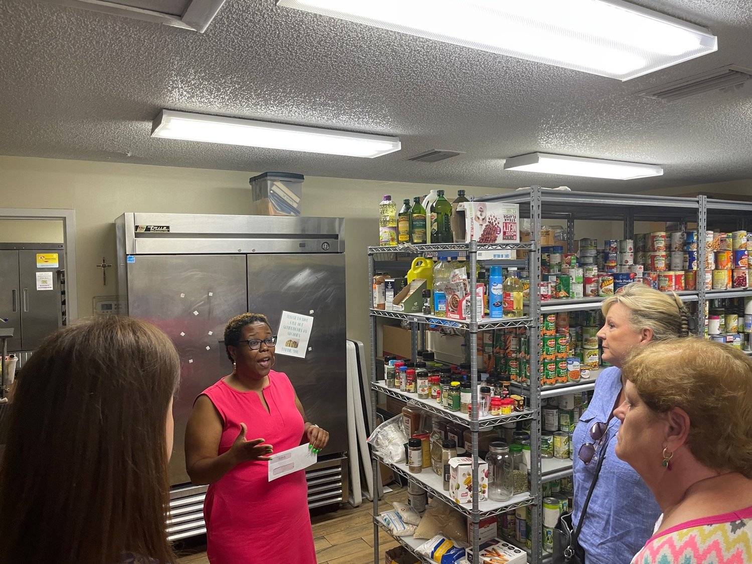 Mission House Program Director Natalie Collier talks about the nonprofit’s food bank.